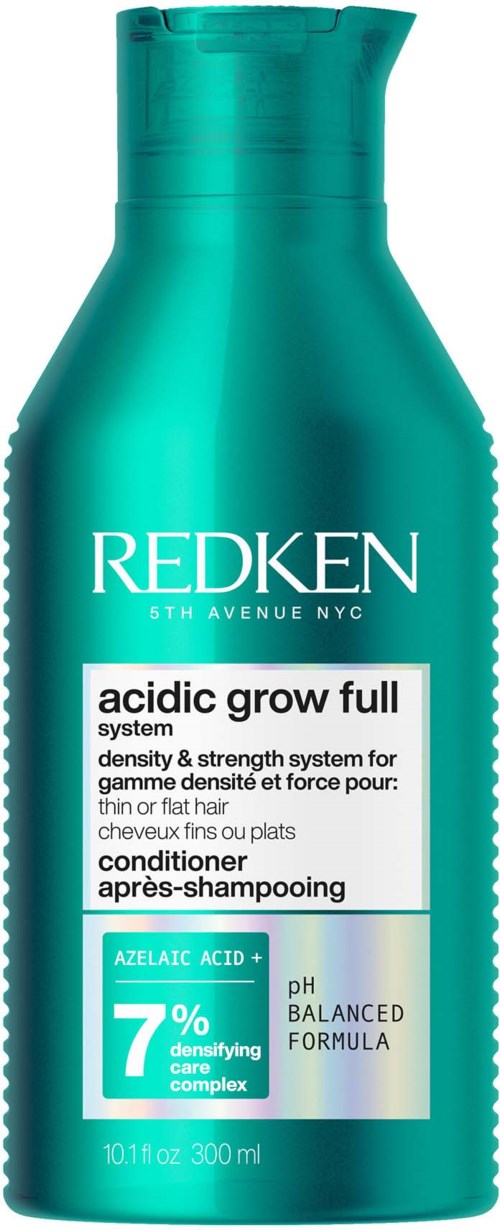 En teal flaska märkt Redken Acidic Grow Full balsam, med information om pH-balans och vårdkomplex.
