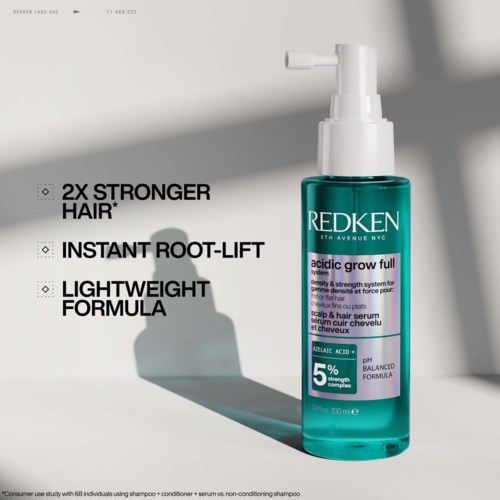 Redken-hårserumflaska, främjar starkare hår, rotlyft, lätt formulering, balanserat pH, innehåller ättiksyra.