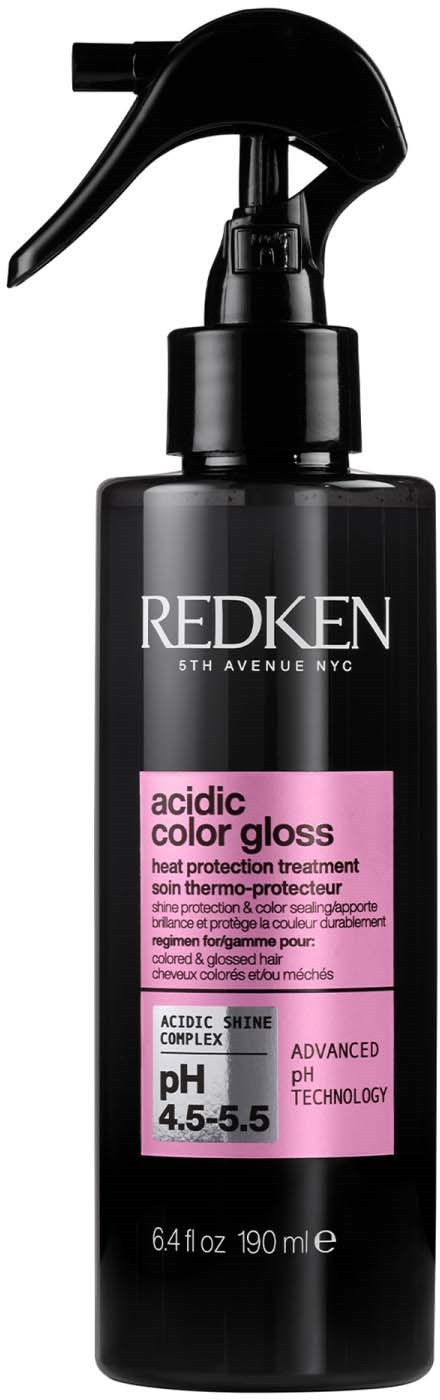 A black spray bottle of Redken acidic color gloss hair treatment with pH 4.5-5.5, for heat protection and color shine.