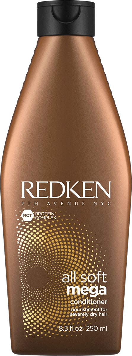 En brun flaska med svart lock märkt "Redken All Soft Mega Conditioner" för torrt hår, 8,5 fluid ounces.