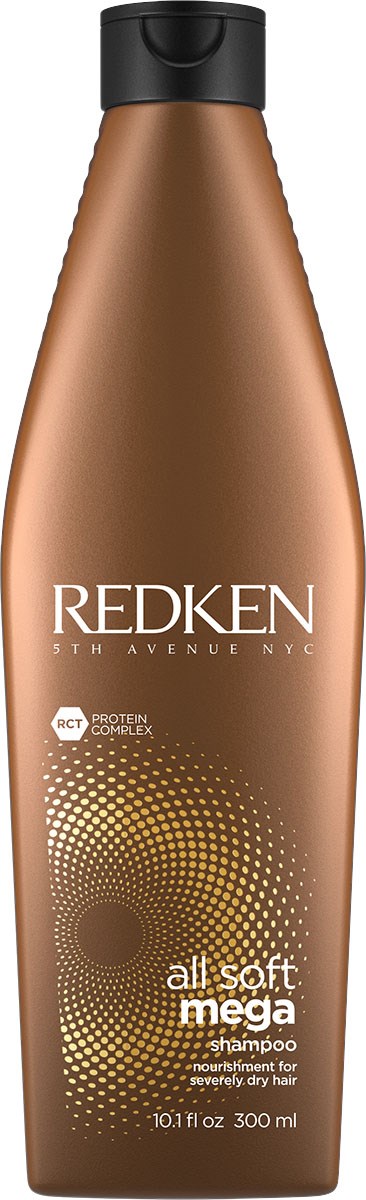 En brun flaska med Redken all soft mega schampo med svart lock och guldprickig design.