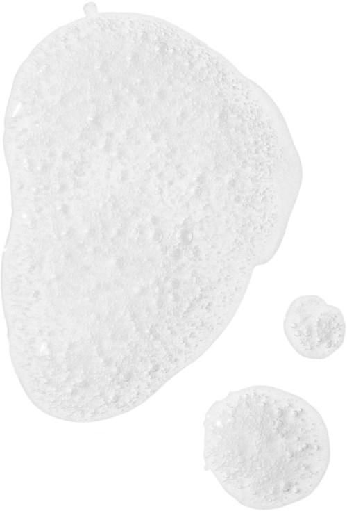 Three white, textured, round objects of different sizes on a gray background.