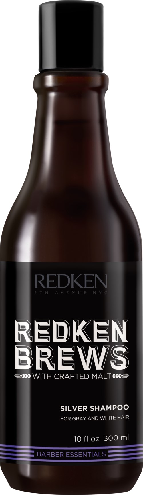 En mörkbrun schampoflaska med svart lock, märkt "Redken Brews Silver Shampoo," för grått hår, 300 ml.