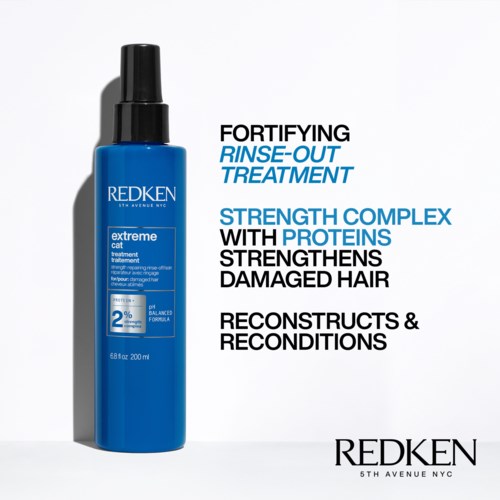 Blaue Flasche mit Redken-Haarbehandlung und Text über Stärkung und Reparatur geschädigten Haars.
