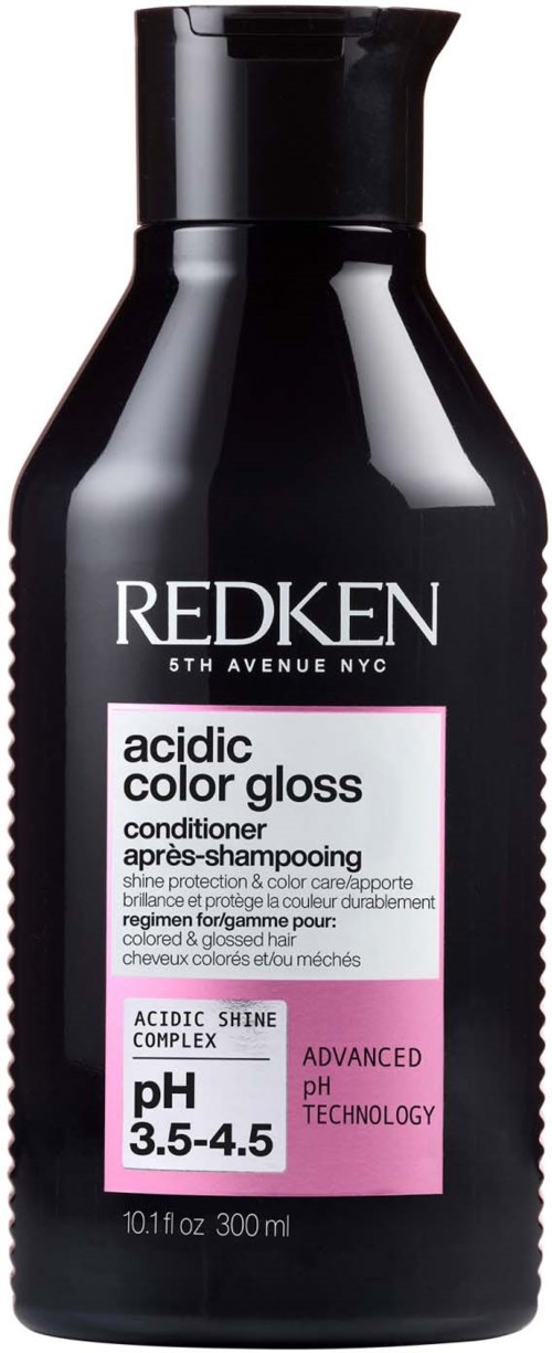 A black bottle of Redken acidic color gloss conditioner for shiny, well-maintained hair with pH 3.5-4.5.