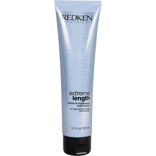 En silverfärgad tub med Redken-produkt märkt 'Extreme Length'. Den är för hårväxt och stärkande, med 150 ml kapacitet.