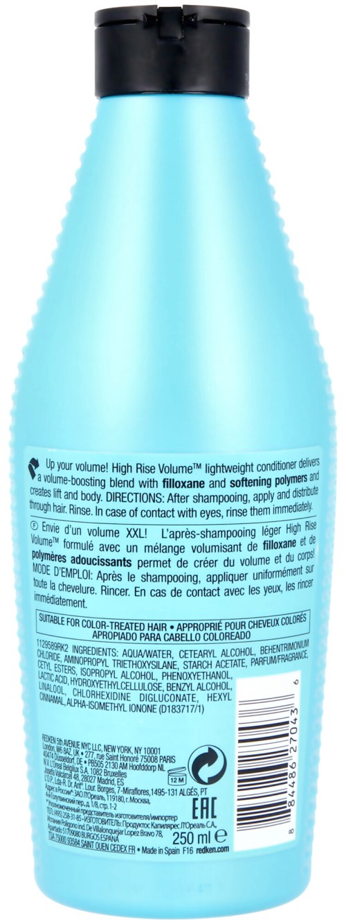 Vaaleansininen pullo mustalla korkilla, sisältää hoitoainetta, 250 ml, takatekstillä ja symboleilla.