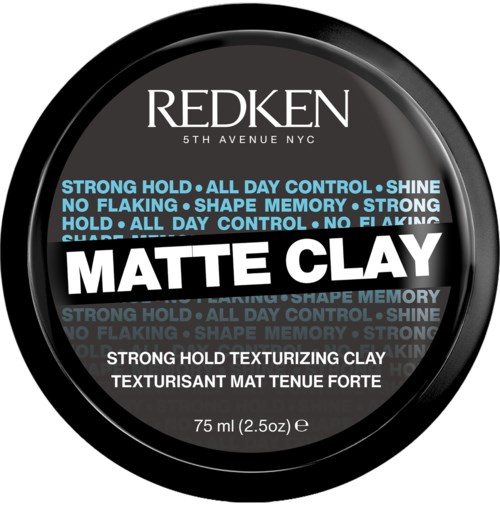 Ett svart runt förvaringsbehållare för Redken Matte Clay med produktdetaljer och fördelar.