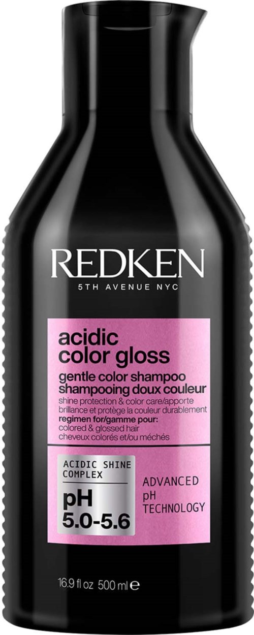 Redken shampoo bottle with black and pink label, emphasizes pH balance and color protection.