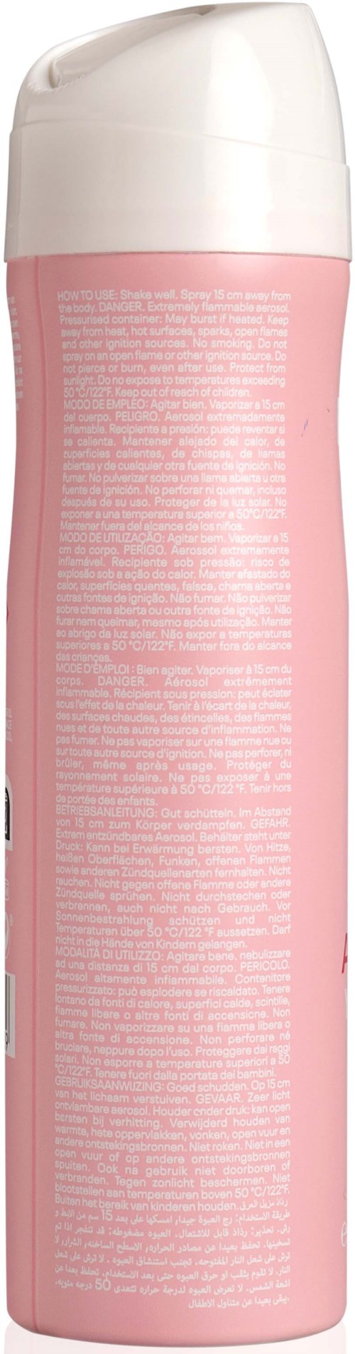 En rosa, cylindrisk sprayflaska med vit lock, fylld med hår- eller kroppsspray.