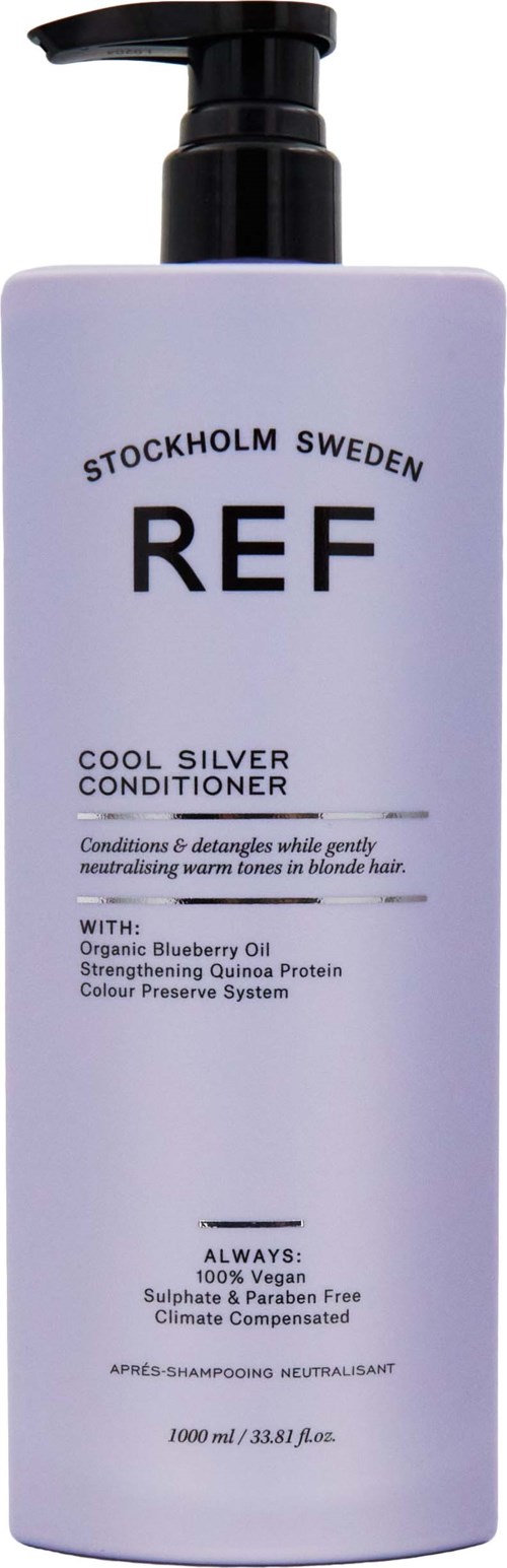 En vit flaska med pump, märkt 'REF Stockholm Sweden' och 'Cool Silver Conditioner.'