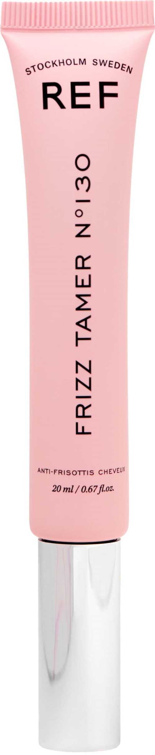 Liten rosa tub med kosmetikkräm med svart och vitt text och vit lock.