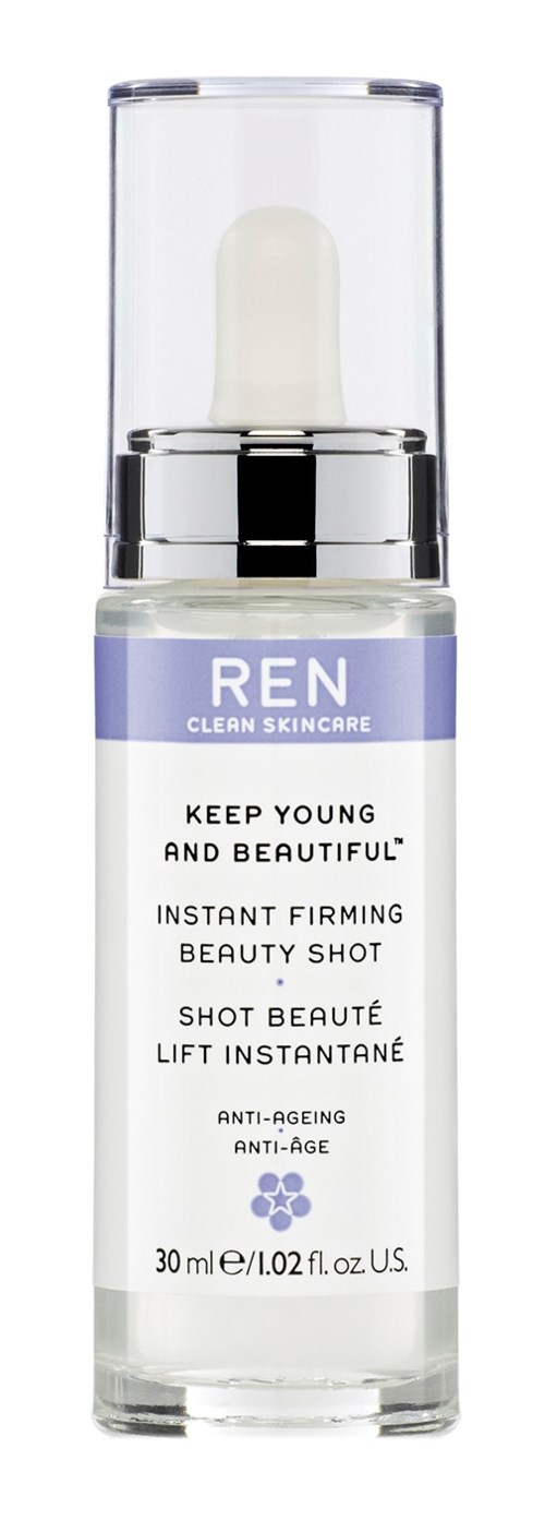 A small clear bottle with a silver cap and purple label, containing a skin care product for anti-aging and firming.