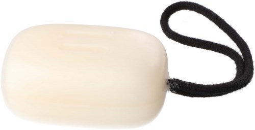 Liten vit tvål på svart band, designad för hand- eller ansiktstvätt.