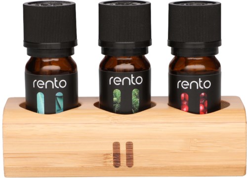 Three small bottles labeled 'rento' with different colored liquids, held in a wooden stand.
