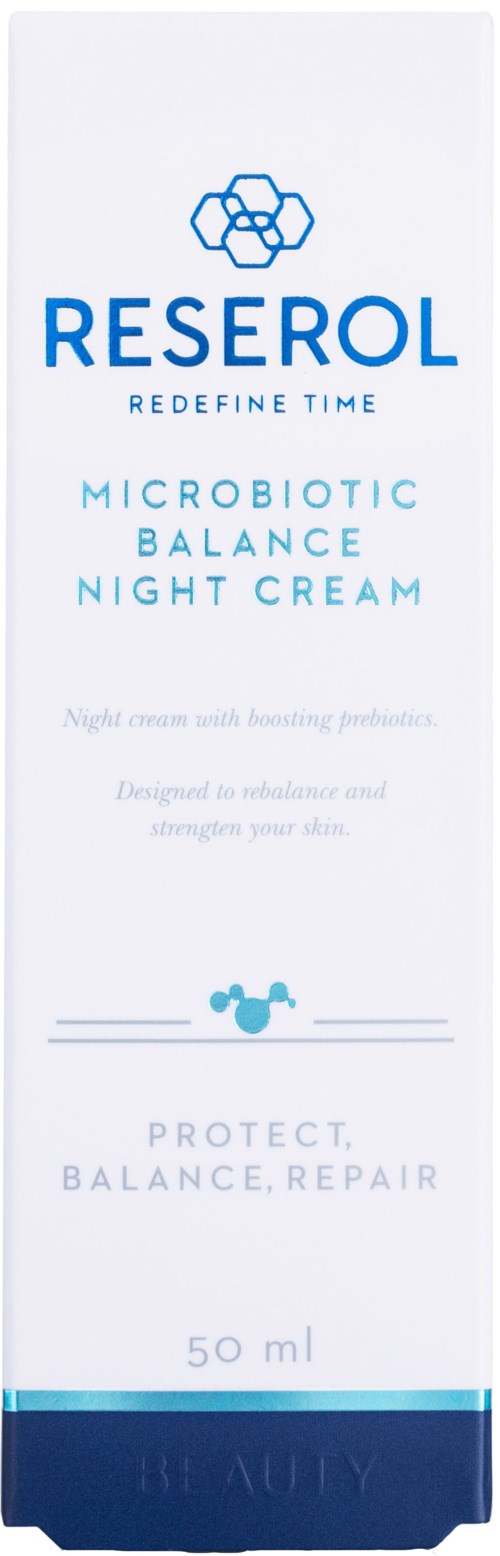 Eine weiße Box mit blauer Schrift und Logo, beworben wird eine Nachtcreme für Hautbalance und Reparatur.