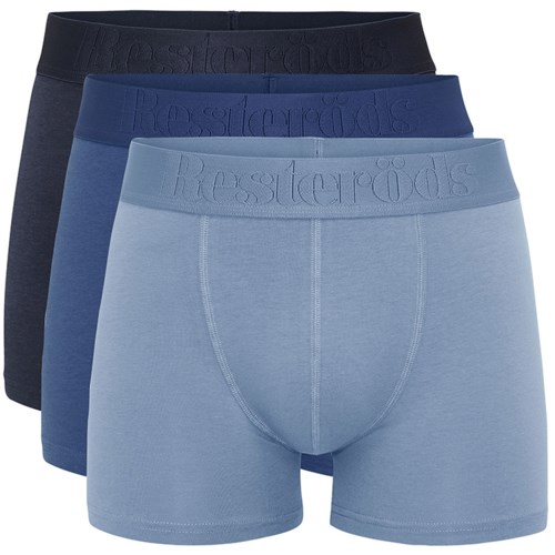 Tre par herrunderställ i mörk, blå och ljusblå färger med elastiska midjeband. Enkel, bekväm design.
