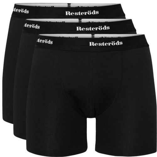 Tre svarta herrunderkläder med vit midja märkt 'Resteröds'.
