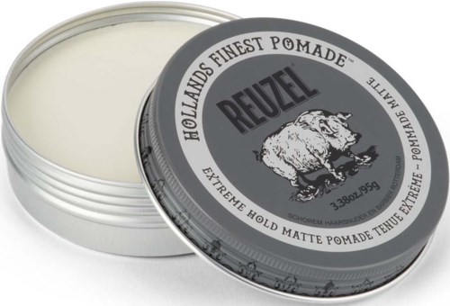 En rund burk med Reuzel mattpasta och en björnlogo på locket, delvis öppen som visar vit pastan.