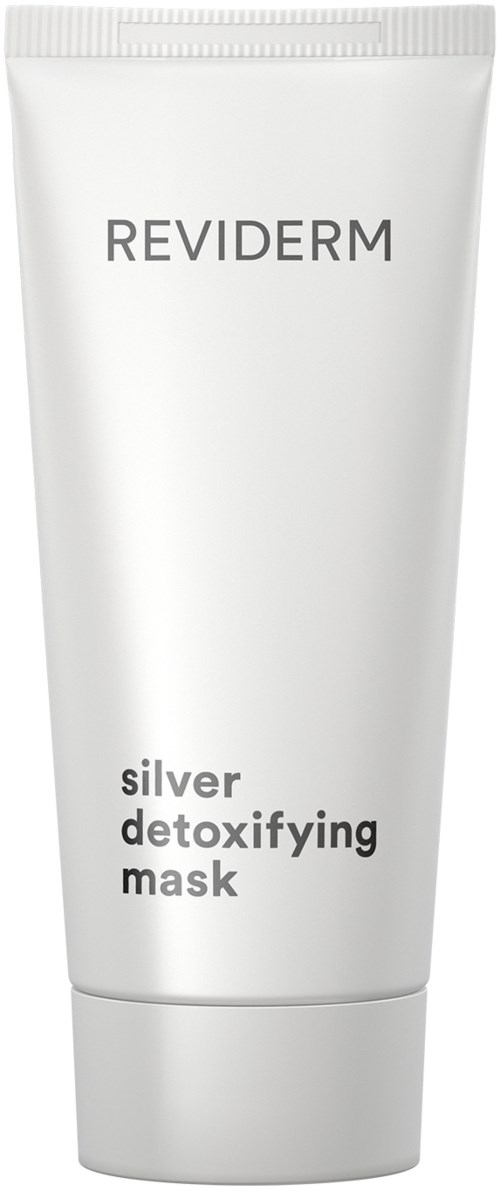 En vit tub märkt Reviderm Silver Detoxifying Mask, enkel design med svart text.
