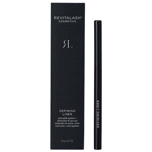 En svart förpackning med vitt text och en svart eyeliner penn bredvid. Förpackningen säger 'Revitalash Cosmetics' och 'Defining Liner.'
