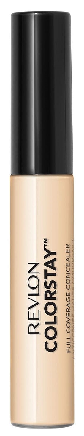 En Revlon ColorStay concealer med svart kork och ljusbeige kropp på svart bakgrund.