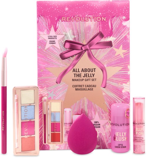 Pink box with makeup items, a pink sponge, and a pink lip balm, decorated with stars and a ribbon.