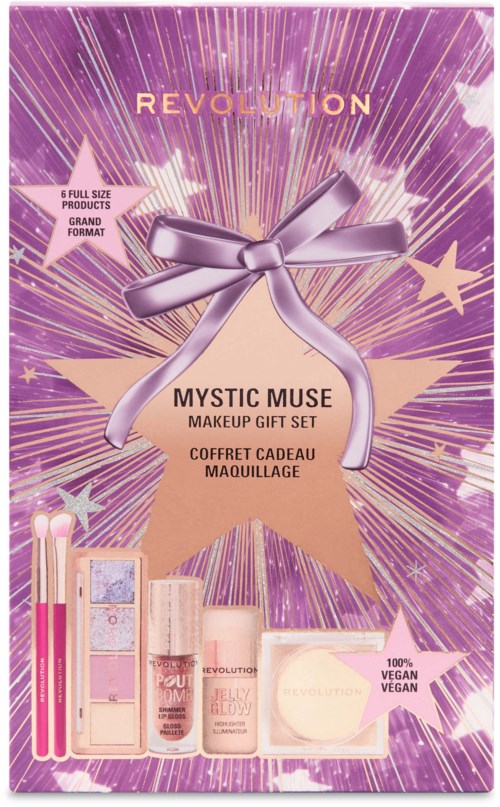 Purple box with a ribbon, star, and makeup products, promoting a Mystic Muse makeup gift set with vegan items.
