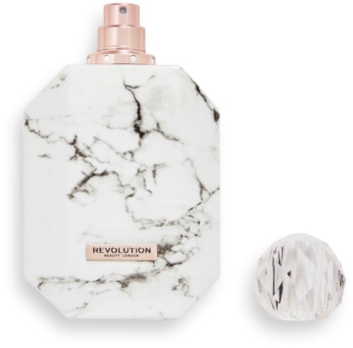 En vit flaska med marmor mönster, en rosa spraykran och ett separat vitt kapshjul i diamantform.