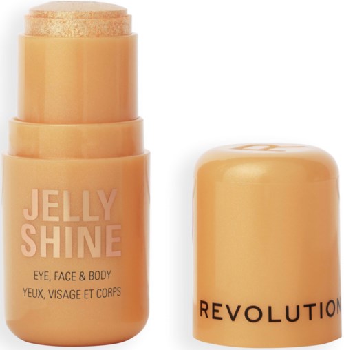 A peach-colored container and lid, labeled 'Jelly Shine' for face, eye, and body, by Revolution.