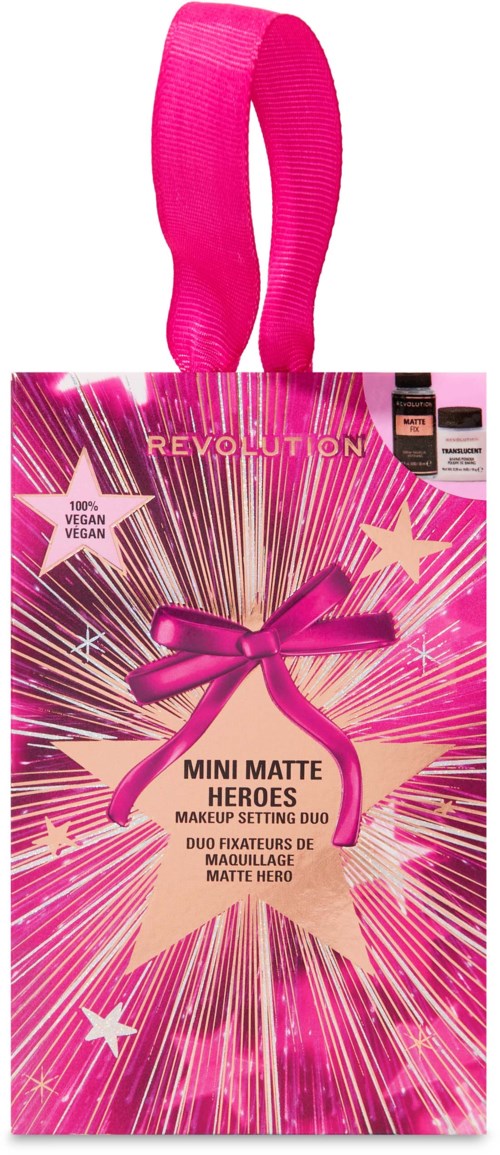 Vaaleanpunainen lappu, jossa on nauha, tähdet ja säteittäiset säteet, mainostaa meikkituotetta nimeltä Mini Matte Heroes.