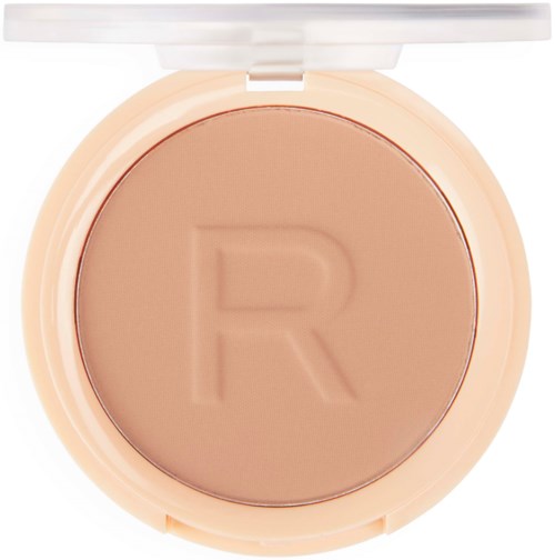 En rund kompakt med beige pudder og et stort R-trykk på.