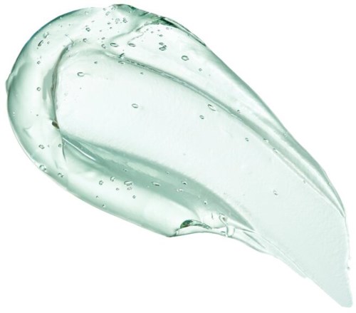 En klar gel med bubblor i form av en droppe, kanske handdesinfektionsgel eller liknande produkt.