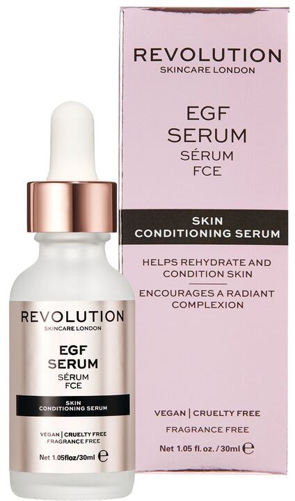 En liten flaska Revolution hudvård EGF-serum med pipett, och dess rosa och svarta förpackning.