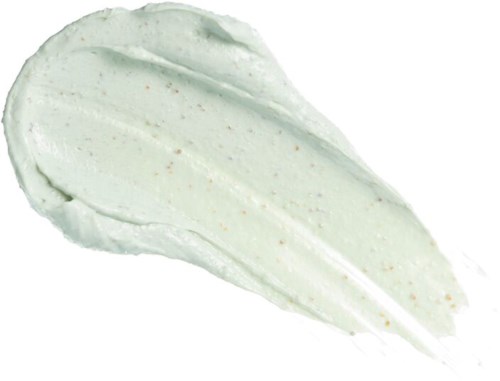 Ett drag av ljusgrön glass med små prickar, ser krämigt och glatt ut.