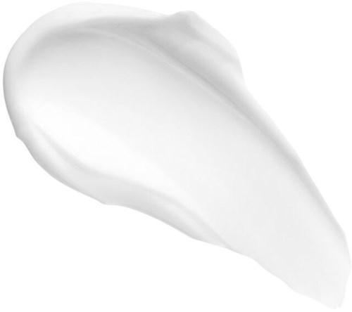 A white cream or lotion spread on a surface, smooth and creamy in appearance.