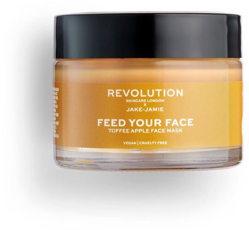 En burk med ansiktsmask märkt "Feed Your Face" med orange förpackning, betonar vegan- och crueltyfree-egenskaper.