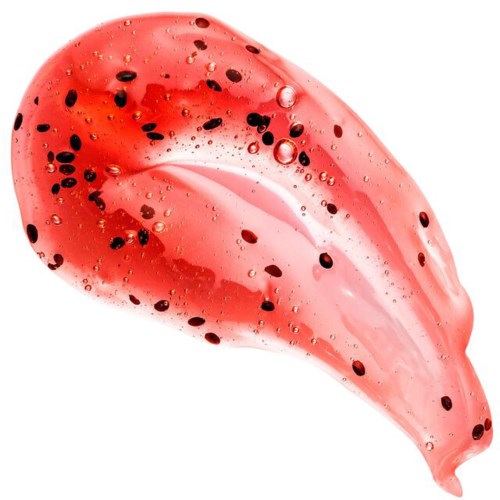 A pinkish-red gel with black specks and bubbles. It has a smooth, shiny surface and is shaped like a teardrop.