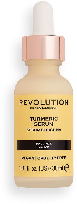 Gul och rosa flaska med pipett, märkt som gurkmejserum från Revolution Skincare London.