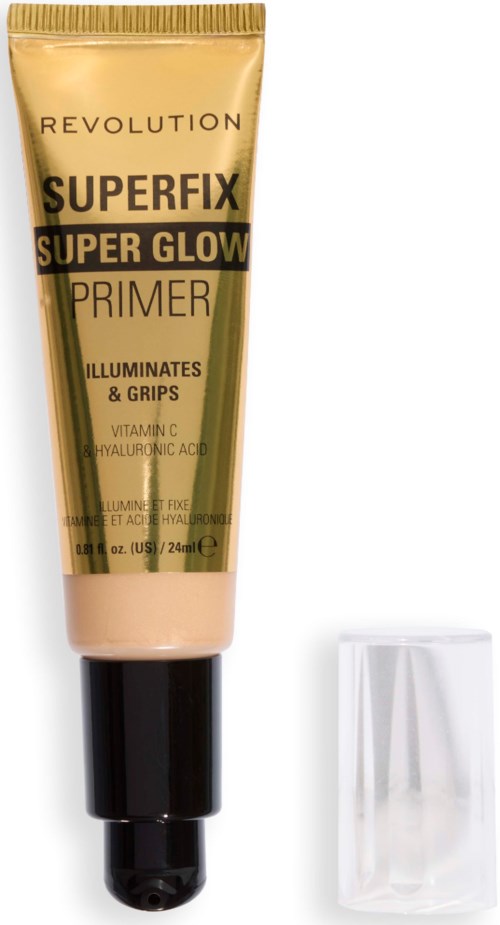 En guldfarvet tube fra Revolution Superfix Super Glow Primer med sort og hvid tekst og et klart låg.