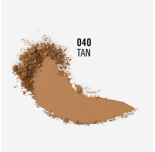 Ein Farbmuster von Make-up oder Puder, gekennzeichnet mit '040 TAN'. Es ist in einer gebogenen Form verteilt.