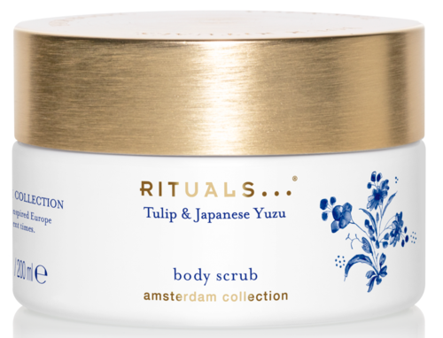 En krukke med kroppsskrubb merket 'RITUALS Tulip & Japanese Yuzu' fra Amsterdam-samlingen med gullfarget topp.