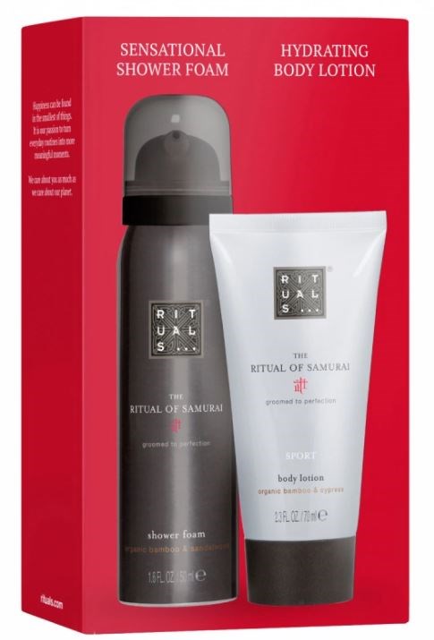 A gift box contains a shower foam and body lotion from Ritual of Samurai line, designed for men, in black and white packaging.