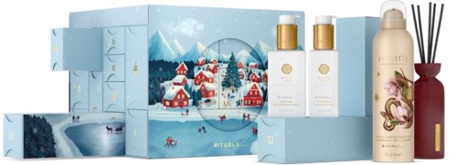 En juleinspirasjonsgavepakke med lotioner, spray og reed diffuser i vinterlig emballasje.