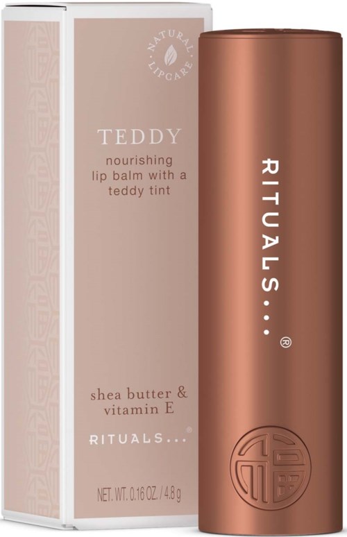 A lipstick product with a beige box labeled 'TEDDY nourishing lip balm' and a metallic rose-colored tube labeled 'RITUALS'.