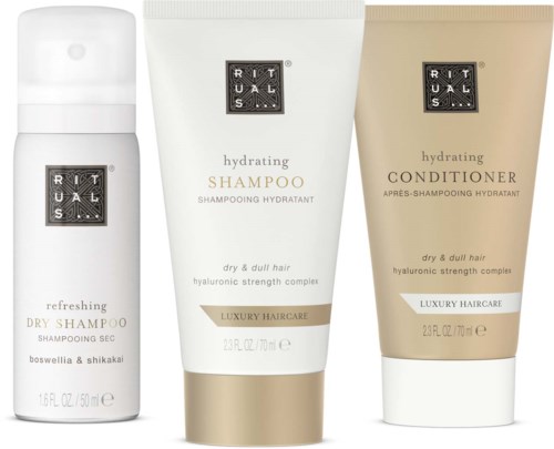 Drie haarverzorgingsproducten: droogshampoo, hydraterende shampoo en conditioner voor droog, dof haar met hyalurontechnologie.