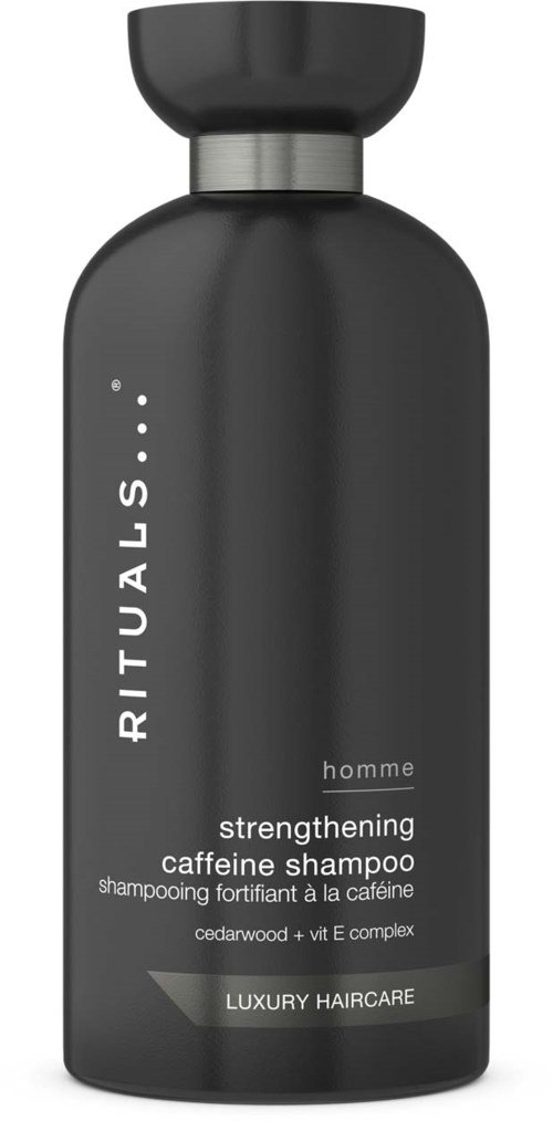 Svart flaska med ett silverlock, märkt som koffeinshampoo för hemmaboost av hårvård.