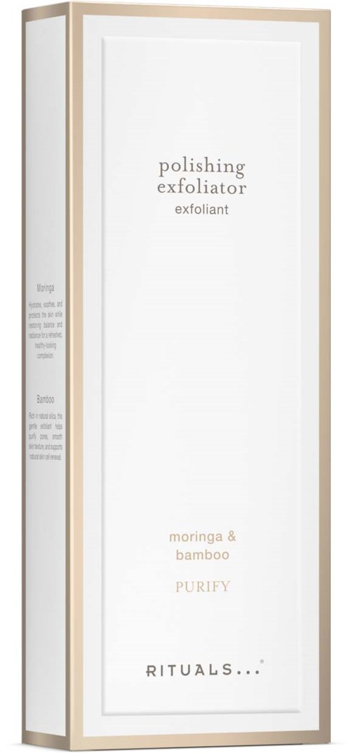 En lång, vit, rektangulär låda med gulddetaljer, märkt som en polerande exfoliator med naturliga ingredienser.