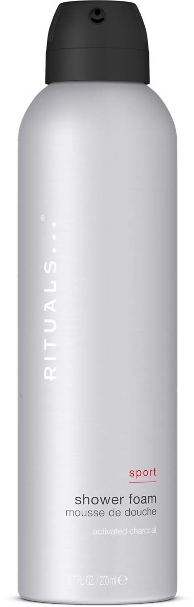 A tall white bottle with a black cap, labeled Rituals sport shower foam, simple design.