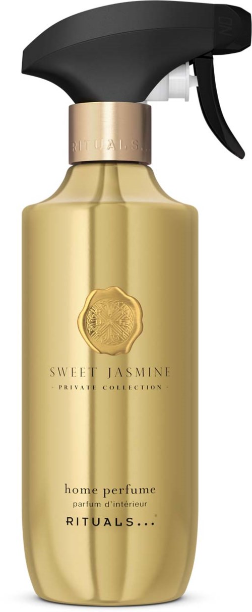 A golden spray bottle with black trigger, labeled Sweet Jasmine home perfume by Rituals. Elegant and shiny.